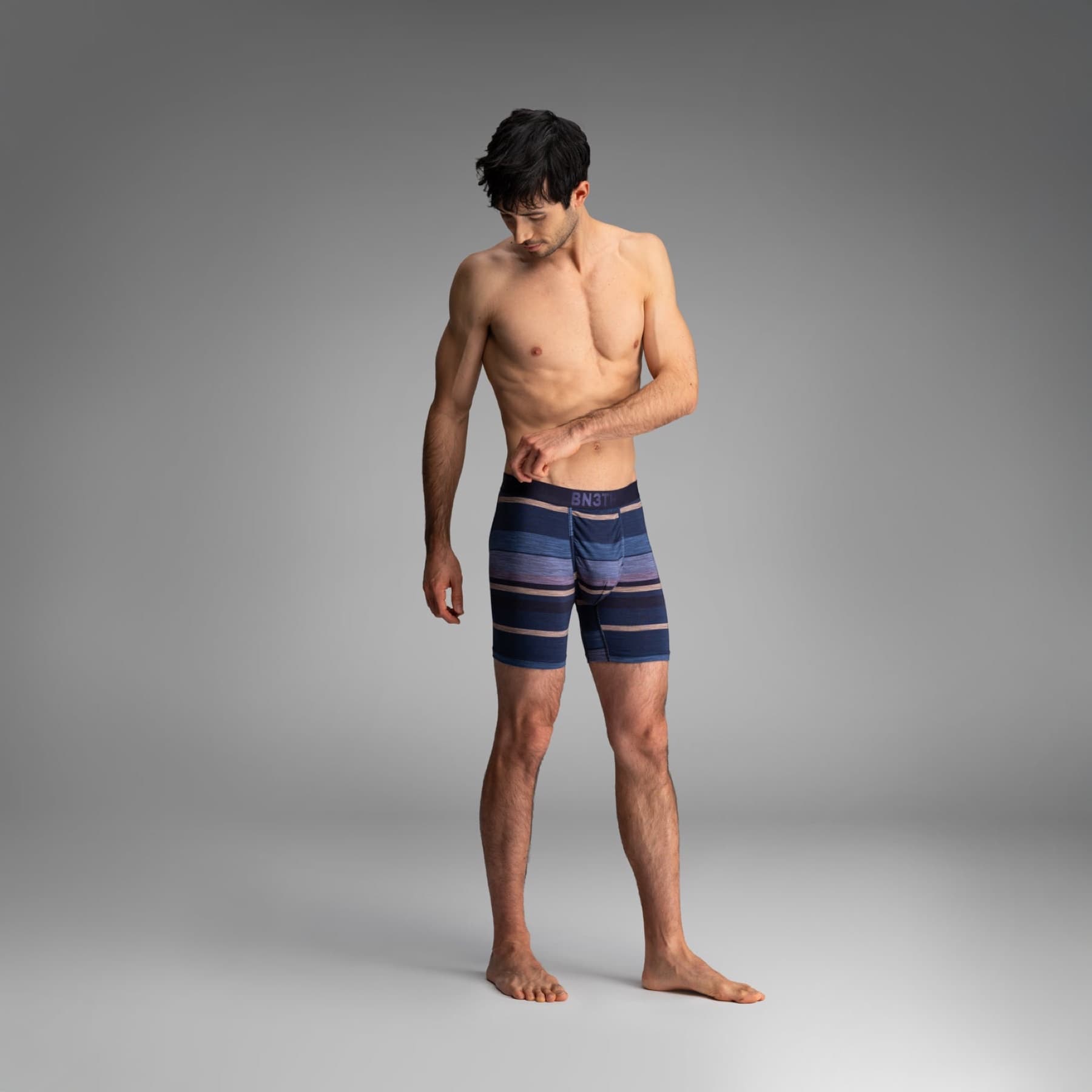 Model wearing navy striped BN3TH Classic Icon boxer briefs