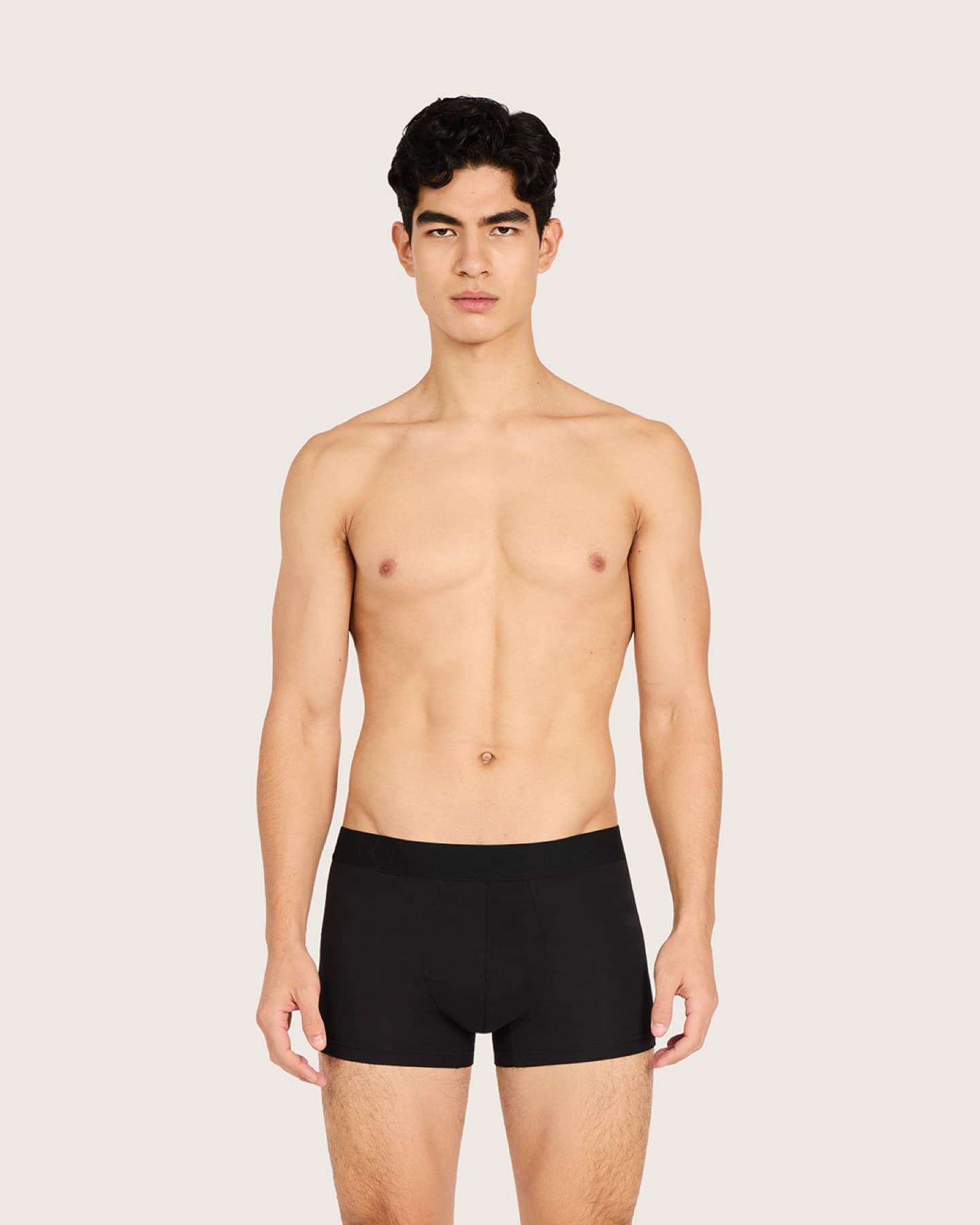Model wearing black Boody Everyday boxer briefs