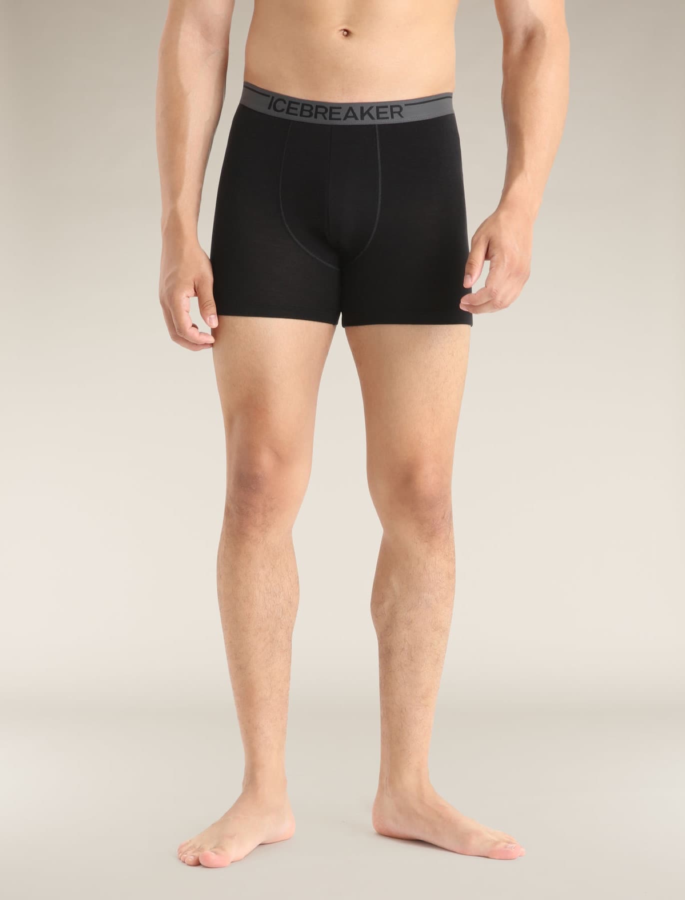 Model wearing black Icebreaker Merino 150 Anatomica boxer briefs
