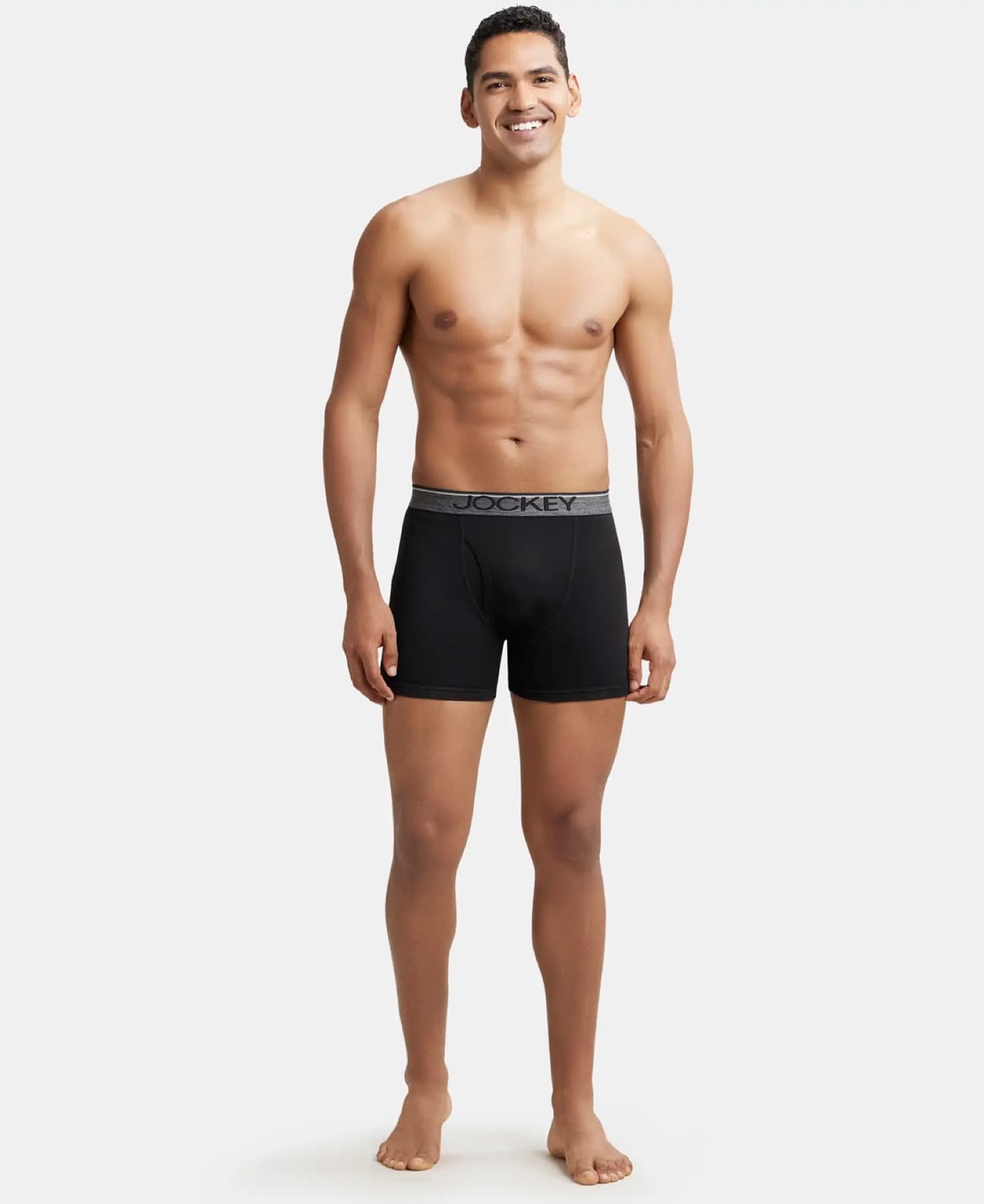 Model wearing black Jockey cotton boxer briefs