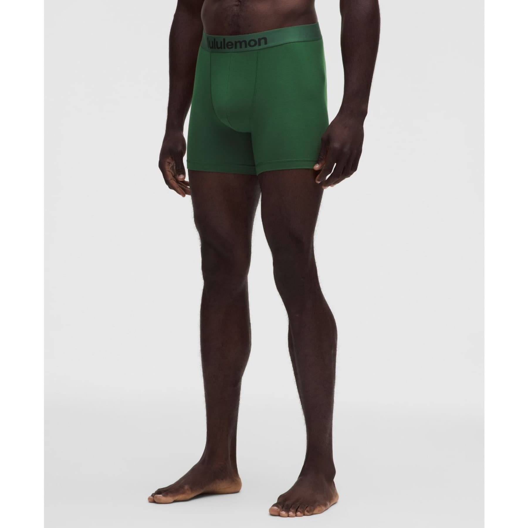 Model wearing green lululemon boxer briefs