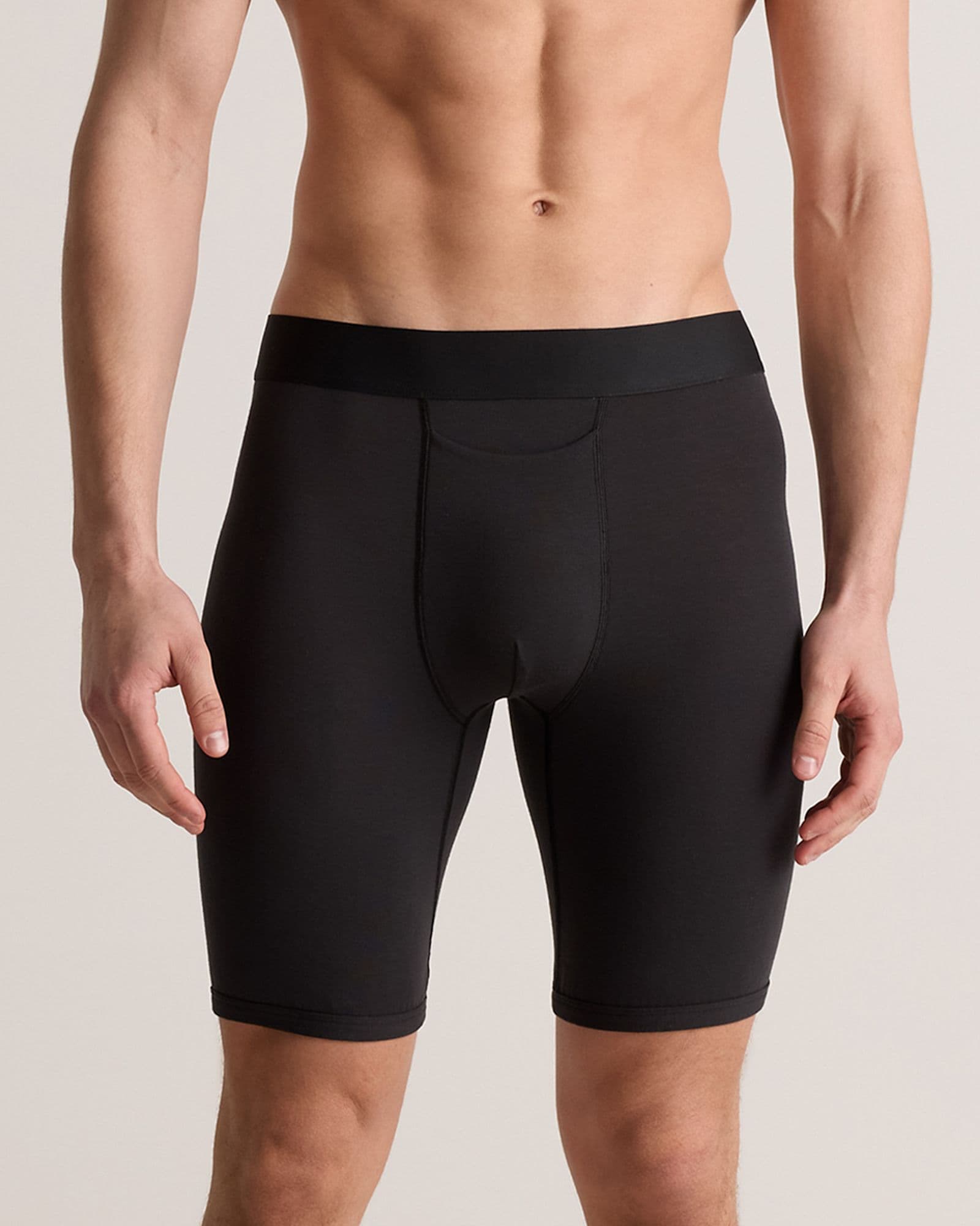 Model wearing black Quince Micromodal eight-inch boxer briefs